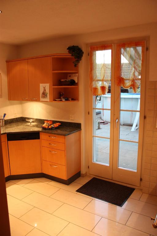 Kuchyň nebo kuchyňský kout v ubytování B&B Stirnimann