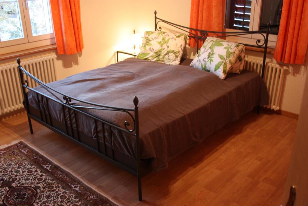 Postel nebo postele na pokoji v ubytování B&B Stirnimann