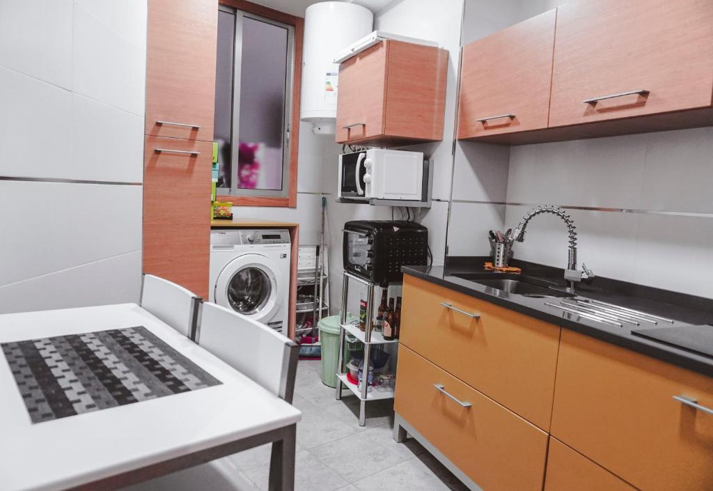 Kuchyňa alebo kuchynka v ubytovaní Piso centro