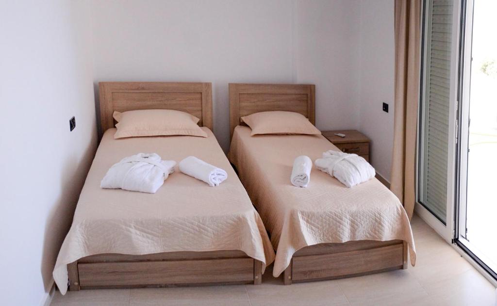 Postel nebo postele na pokoji v ubytování Villa Xenia Stalis