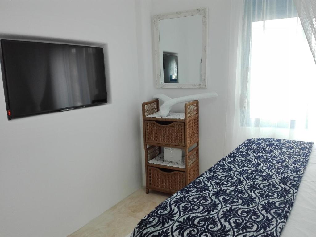 Postel nebo postele na pokoji v ubytování Tilos Island house
