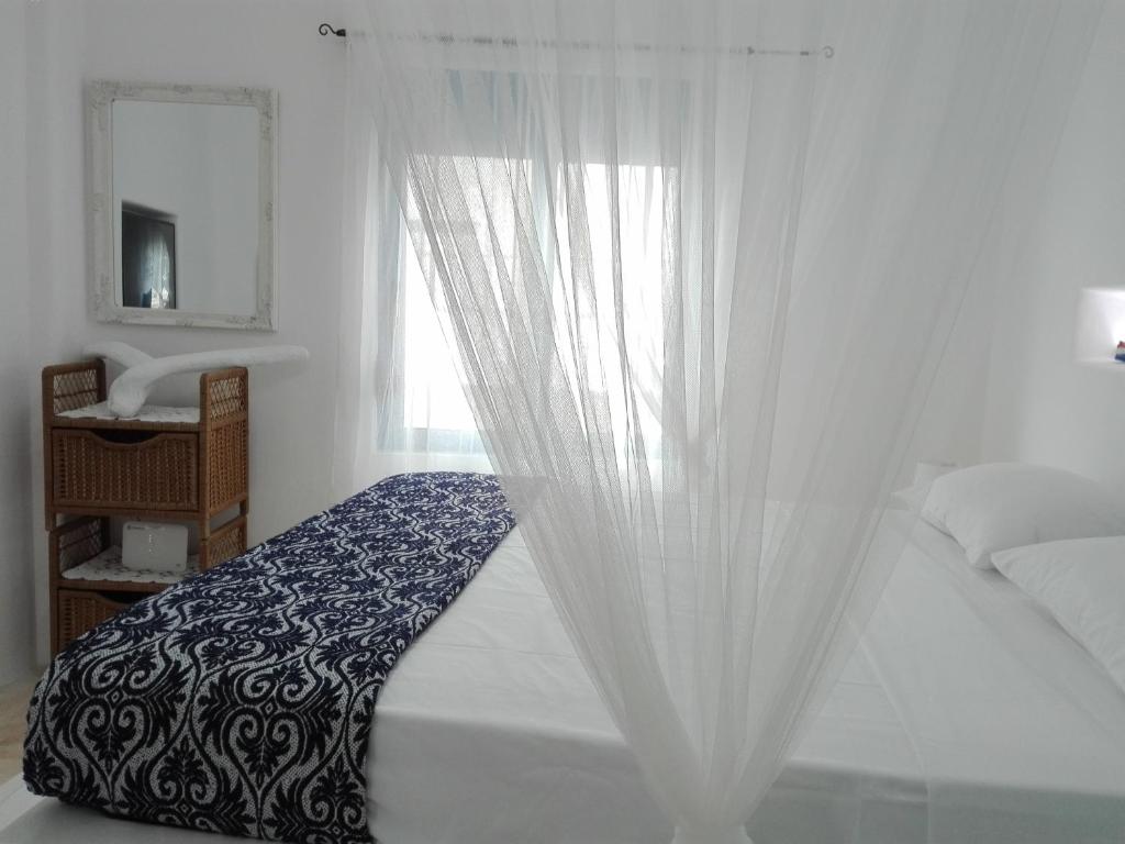 Postel nebo postele na pokoji v ubytování Tilos Island house