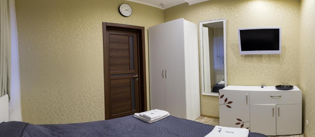 Postel nebo postele na pokoji v ubytování Art house Hostel
