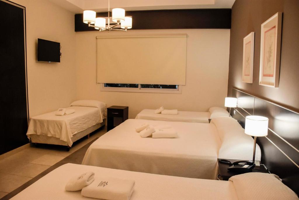 Letto o letti in una camera di Hostería Atahualpa Yupanqui