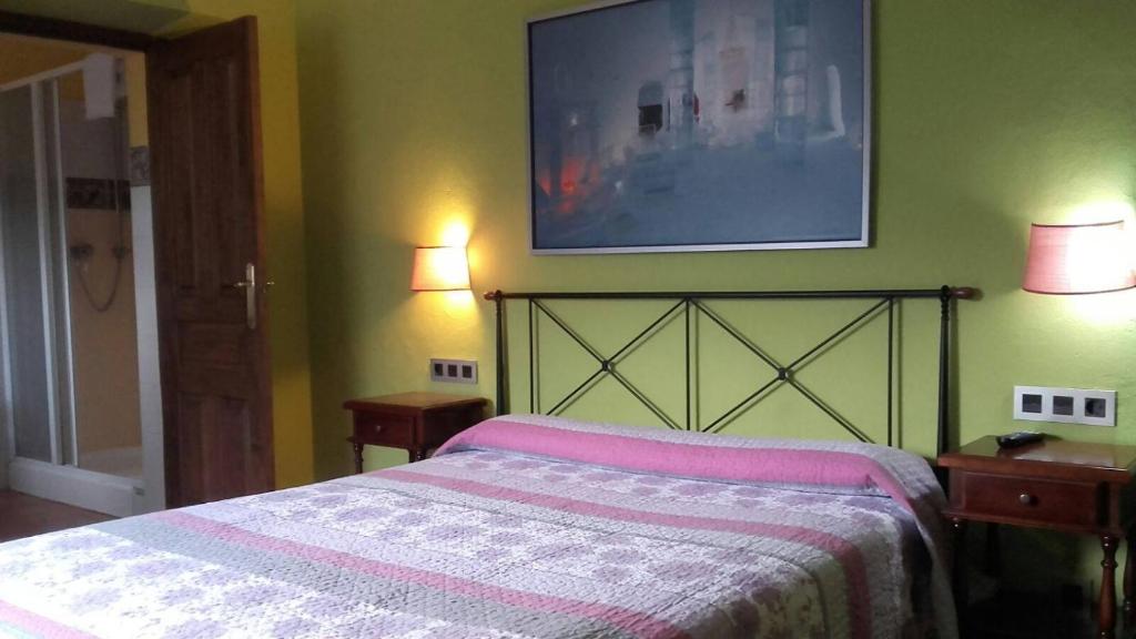Postel nebo postele na pokoji v ubytování Hotel Rural Posada Del Monasterio