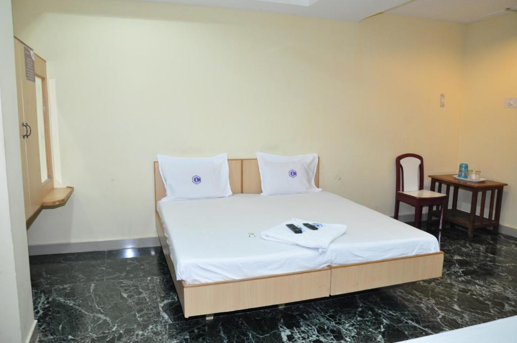 Postel nebo postele na pokoji v ubytování Hotel Chanma International
