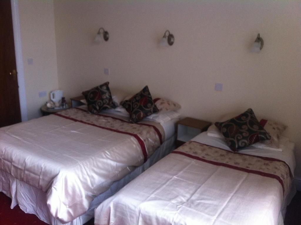 Postel nebo postele na pokoji v ubytování Viking Hotel