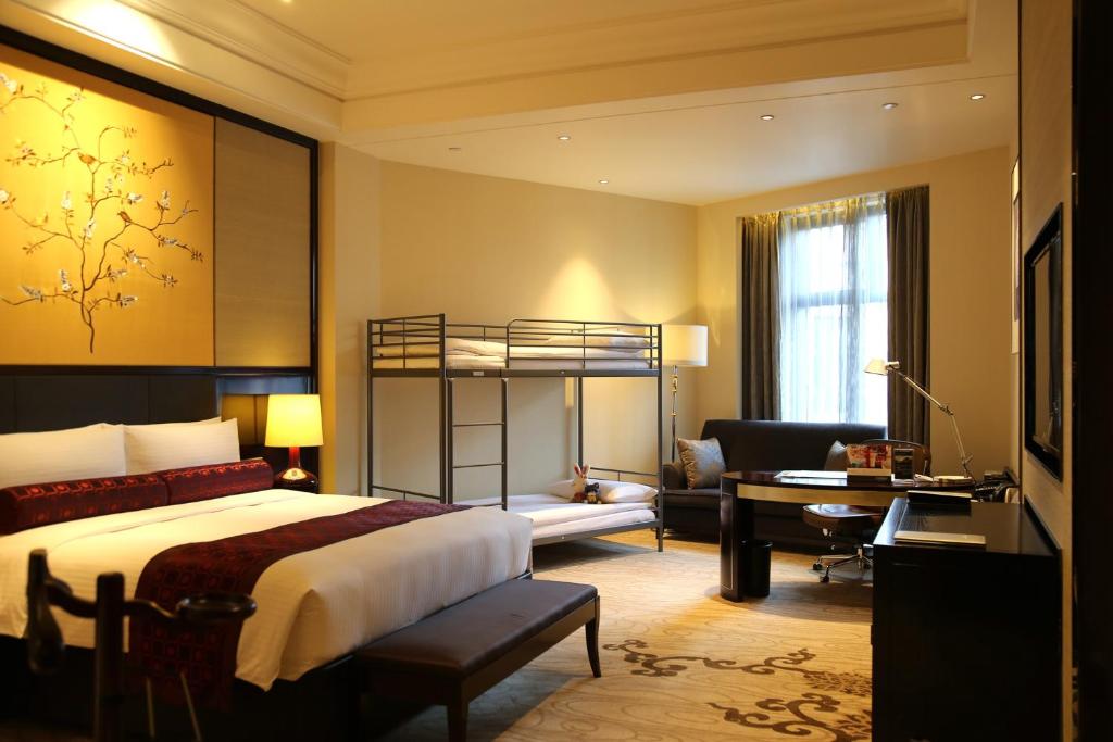 Postel nebo postele na pokoji v ubytování Wyndham Grand Xi'an South