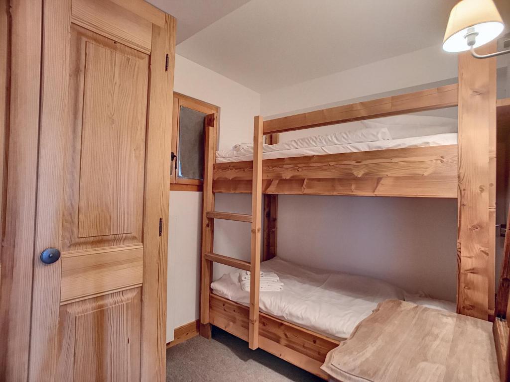 Postel nebo postele na pokoji v ubytování Apartments Roxes