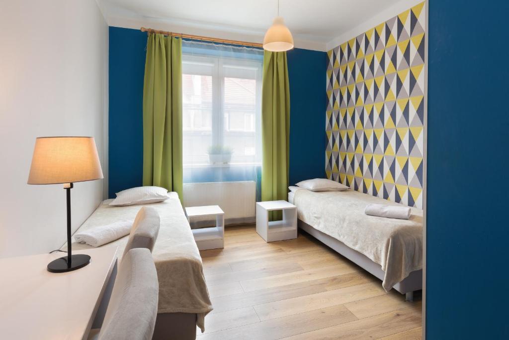 Postel nebo postele na pokoji v ubytování Premium Hostel