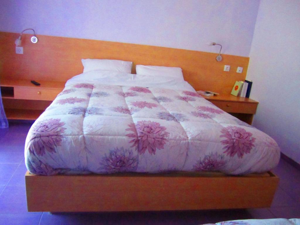 Posteľ alebo postele v izbe v ubytovaní Santa Xenia