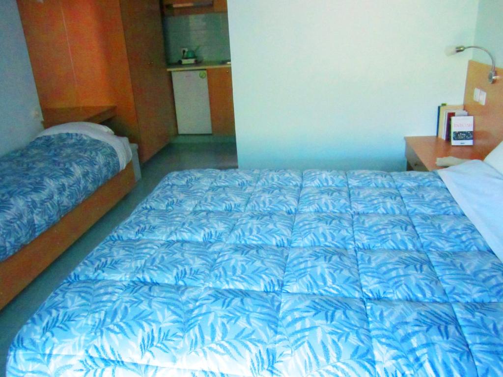 Posteľ alebo postele v izbe v ubytovaní Santa Xenia