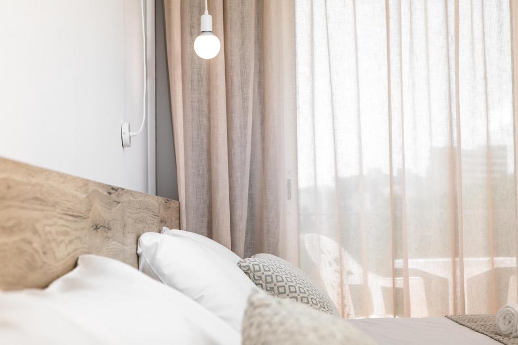 Кровать или кровати в номере RVHotels Nieves Mar
