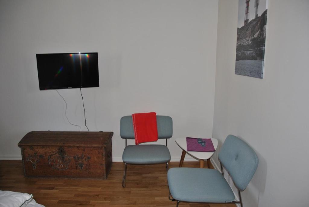 TV a/nebo společenská místnost v ubytování Sjöhuset