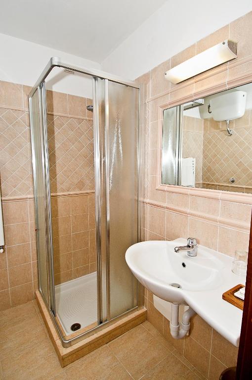 Koupelna v ubytování Hotel Posta