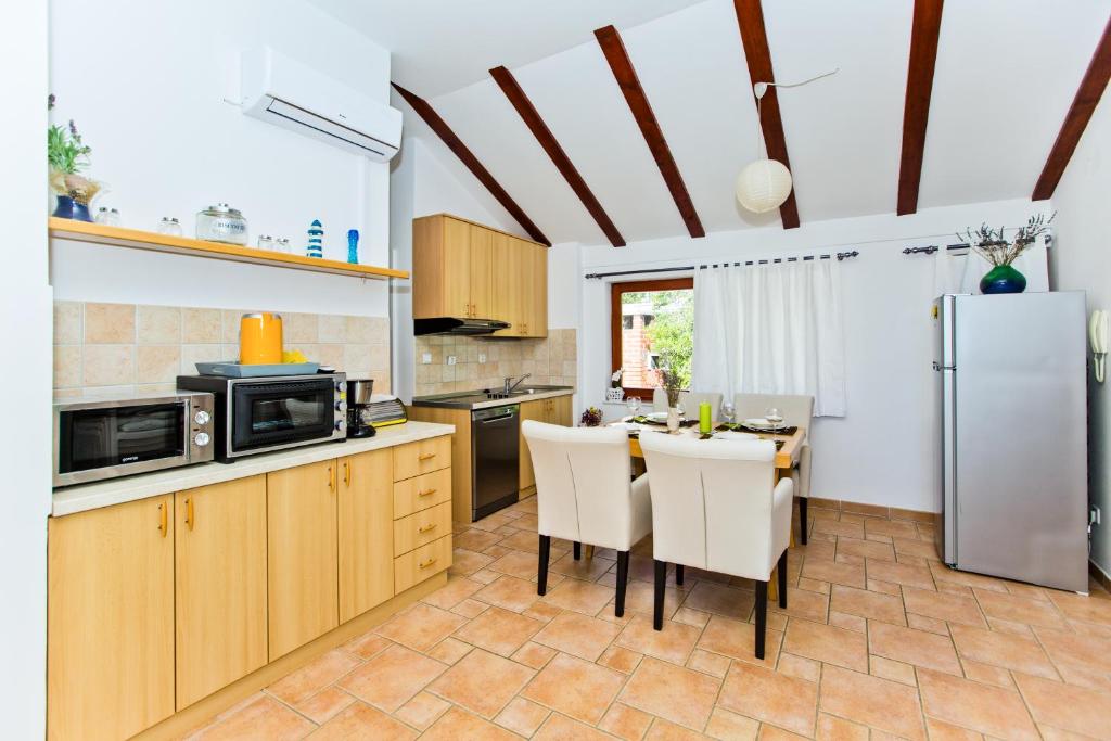 Kuchyň nebo kuchyňský kout v ubytování Apartment Duda