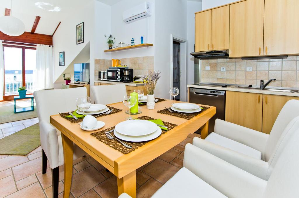 Kuchyň nebo kuchyňský kout v ubytování Apartment Duda
