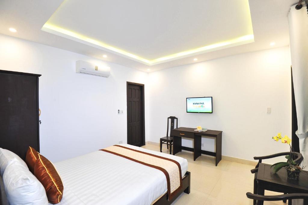 TV a/nebo společenská místnost v ubytování Hoi An Bali Homestay
