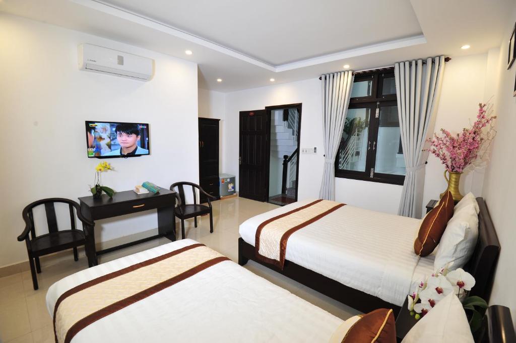 TV a/nebo společenská místnost v ubytování Hoi An Bali Homestay