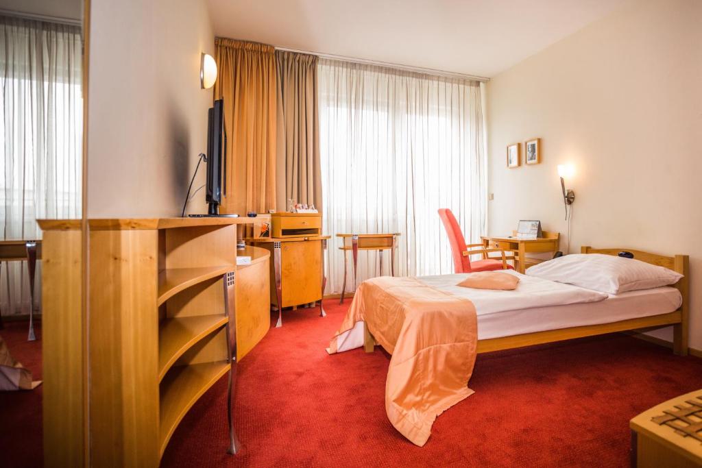 Postel nebo postele na pokoji v ubytování Hotel SET