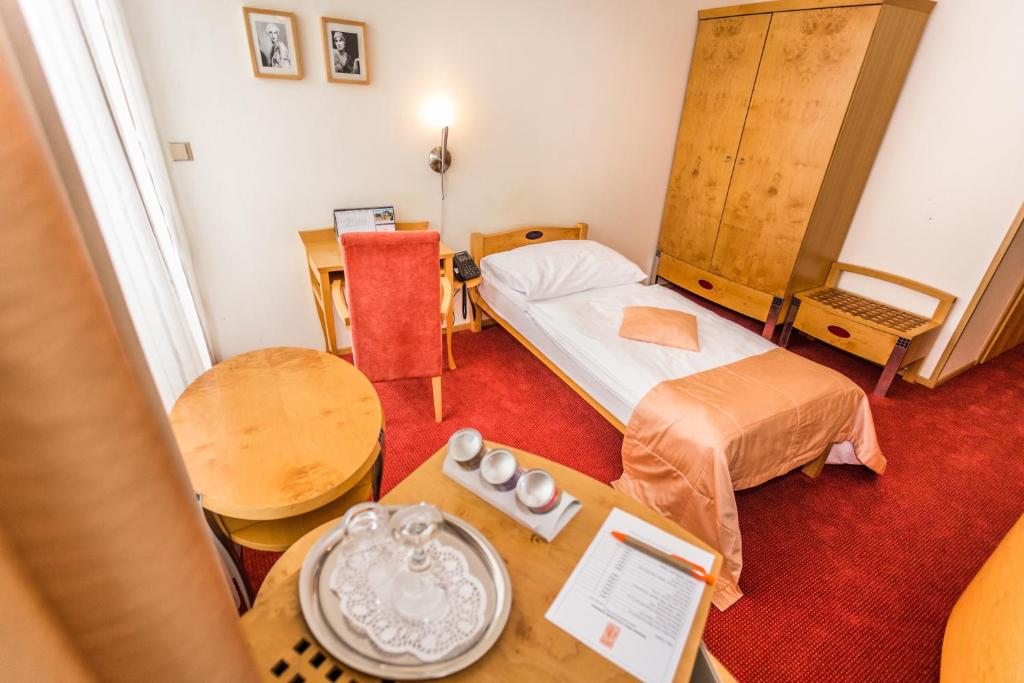 Postel nebo postele na pokoji v ubytování Hotel SET