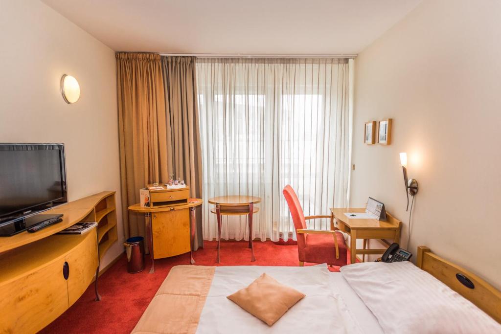 TV a/nebo společenská místnost v ubytování Hotel SET