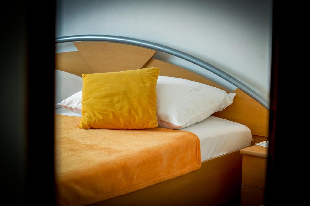 Posteľ alebo postele v izbe v ubytovaní Apartments L&L
