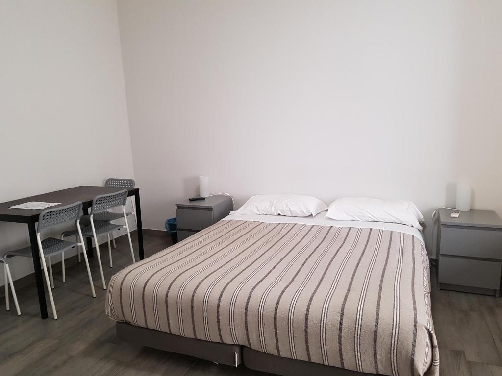 Postel nebo postele na pokoji v ubytování Beda Ragusa