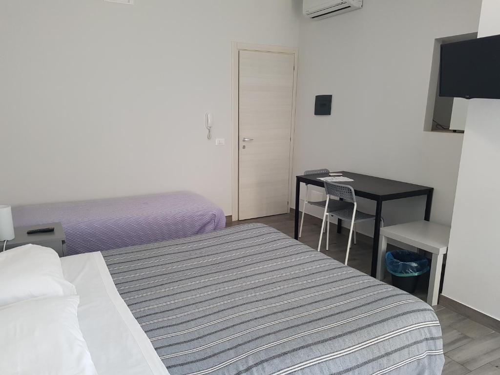 Postel nebo postele na pokoji v ubytování Beda Ragusa