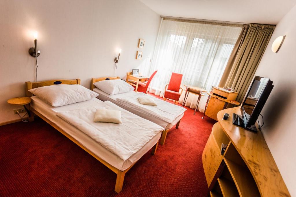 TV a/nebo společenská místnost v ubytování Hotel SET