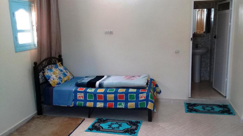 Postel nebo postele na pokoji v ubytování Azur Tafraout
