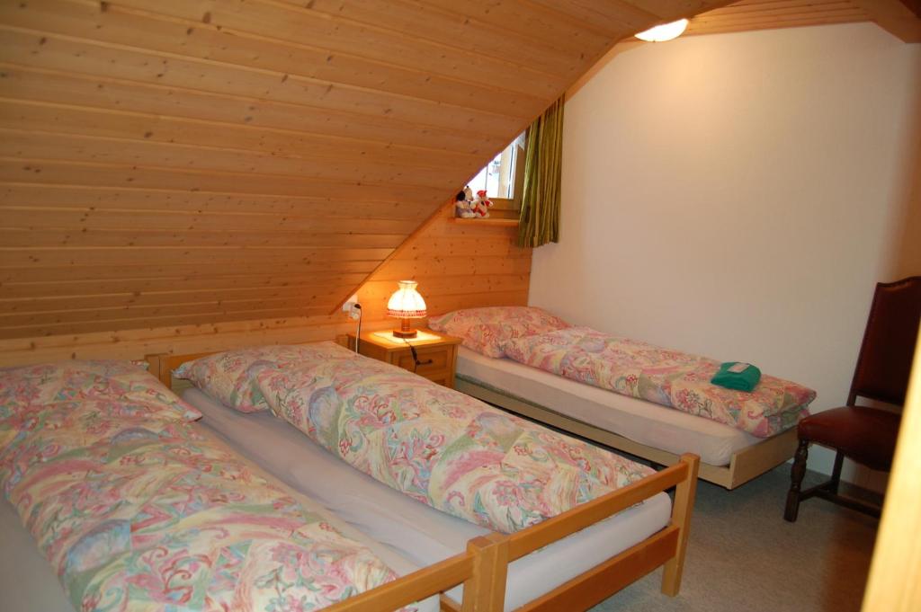 Postel nebo postele na pokoji v ubytování Gasthaus Schäfli