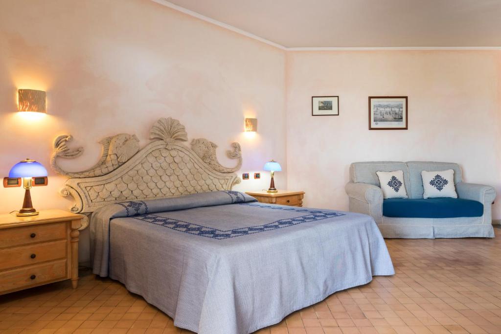 Кровать или кровати в номере Hotel Poseidonia