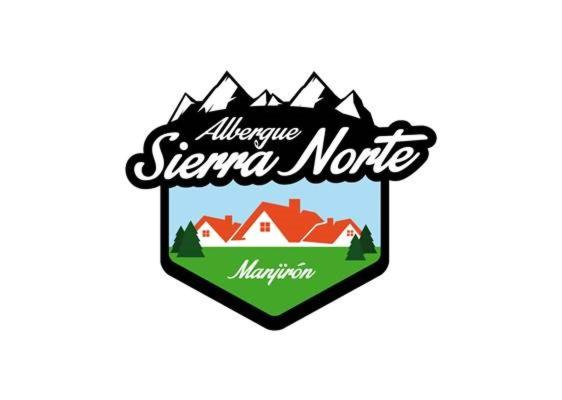 ein Logo für ein Serrano Motel in Albuquerque in der Unterkunft Albergue Sierra Norte in Manjirón