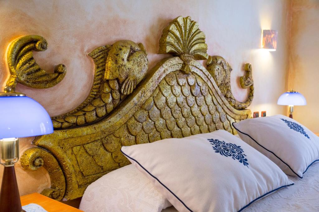 Кровать или кровати в номере Hotel Poseidonia