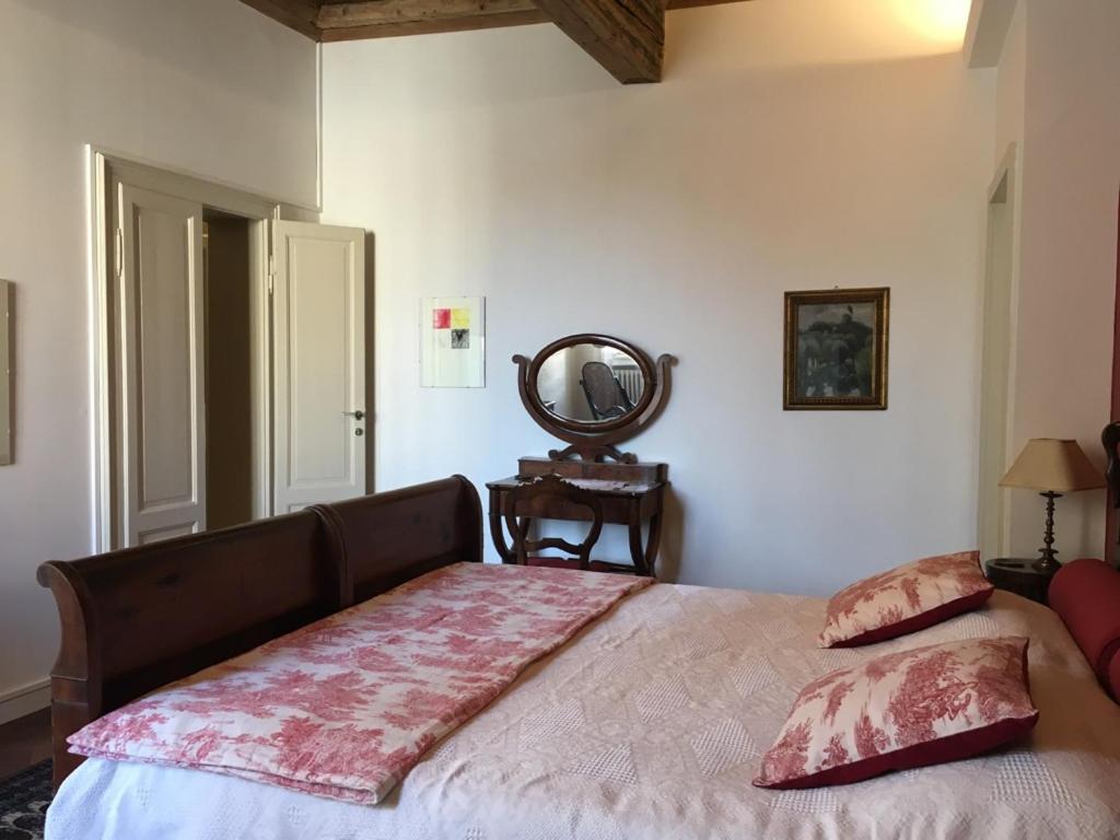 Postel nebo postele na pokoji v ubytování B&B L'Affresco
