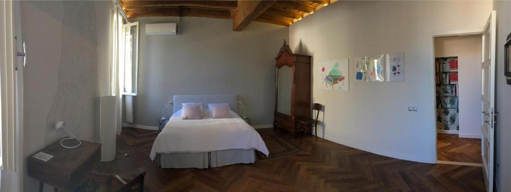Postel nebo postele na pokoji v ubytování B&B L'Affresco
