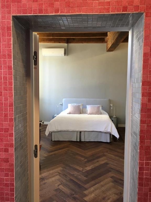 Postel nebo postele na pokoji v ubytování B&B L'Affresco