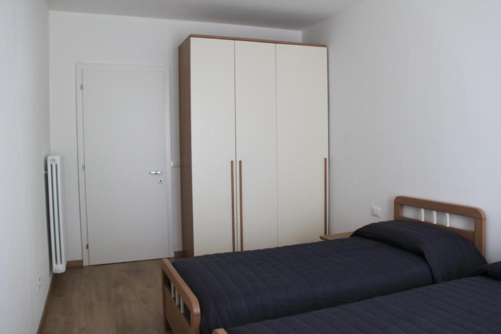 Posteľ alebo postele v izbe v ubytovaní Domus Helios