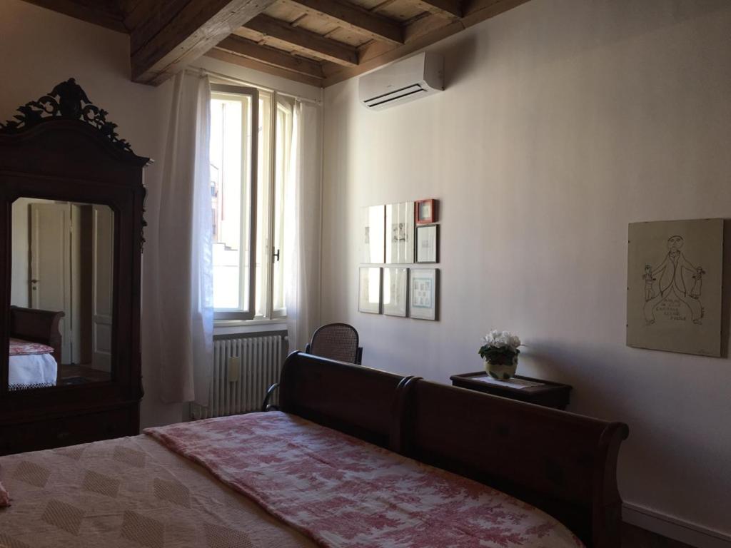 Postel nebo postele na pokoji v ubytování B&B L'Affresco