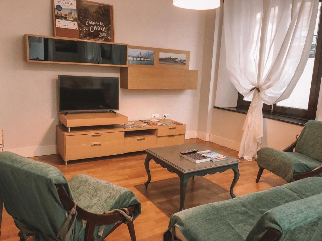 TV a/nebo společenská místnost v ubytování Apodaca Rooms