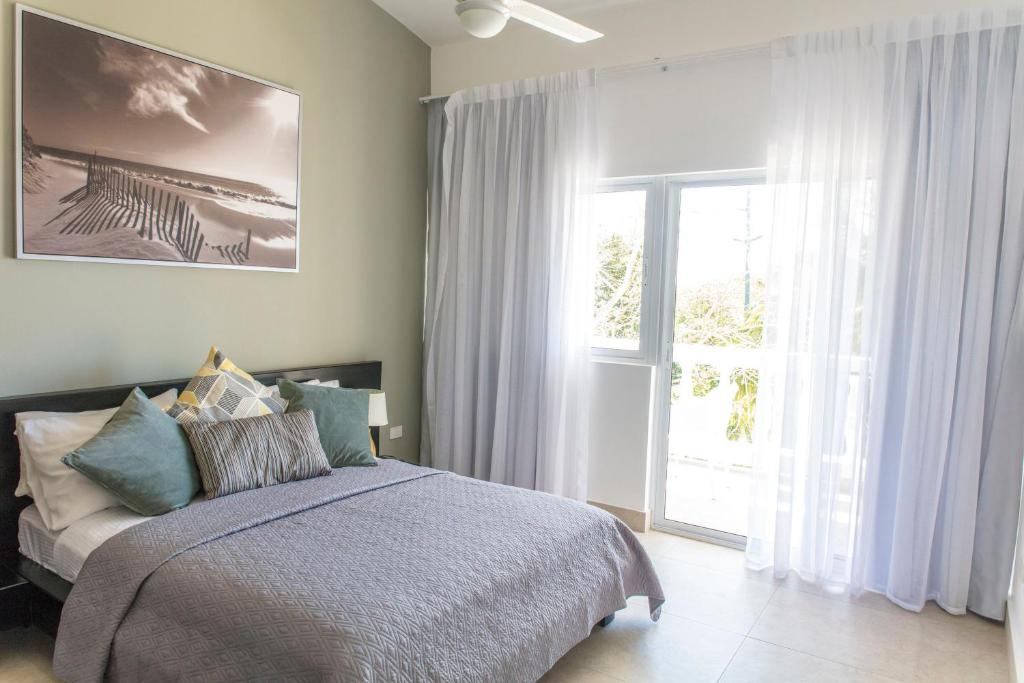 Postel nebo postele na pokoji v ubytování Ocean Palms Residences