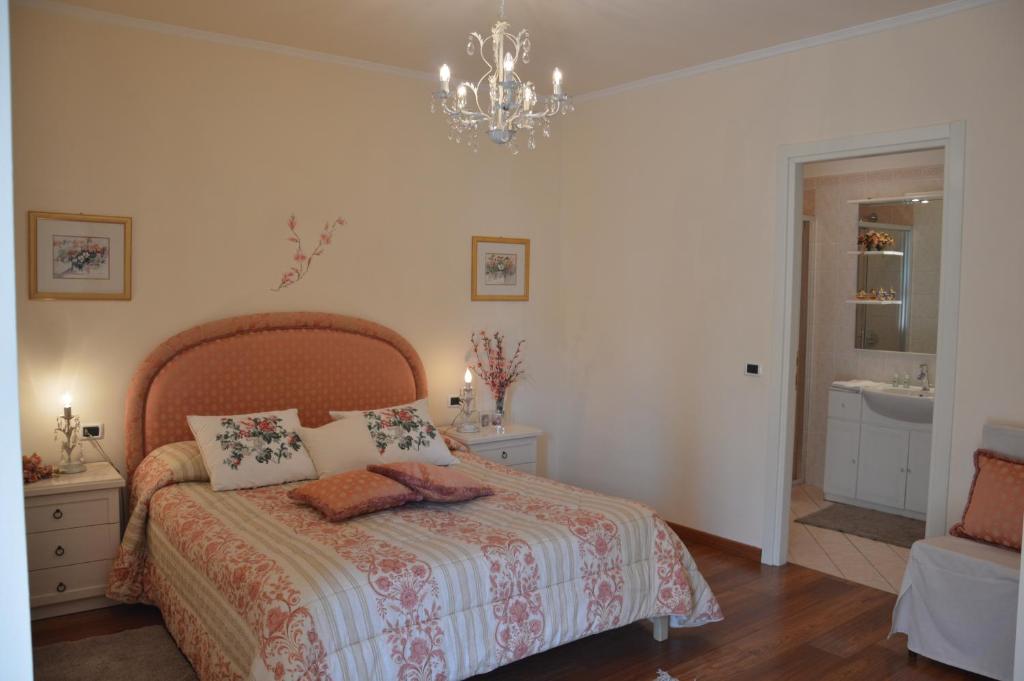 Postel nebo postele na pokoji v ubytování Casa Eleganza