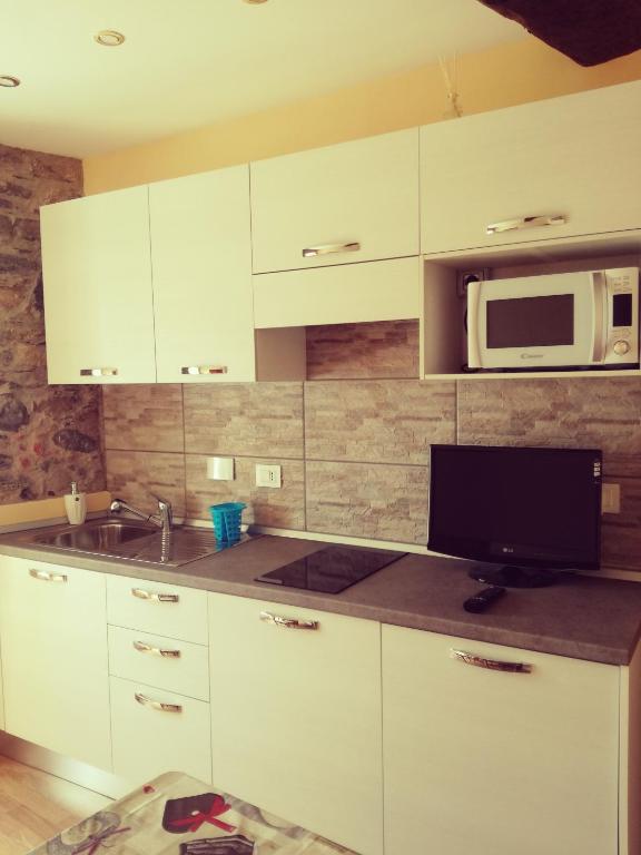 Kuchyň nebo kuchyňský kout v ubytování Casa di Stella