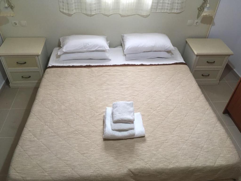 Postel nebo postele na pokoji v ubytování Laskas Apartment