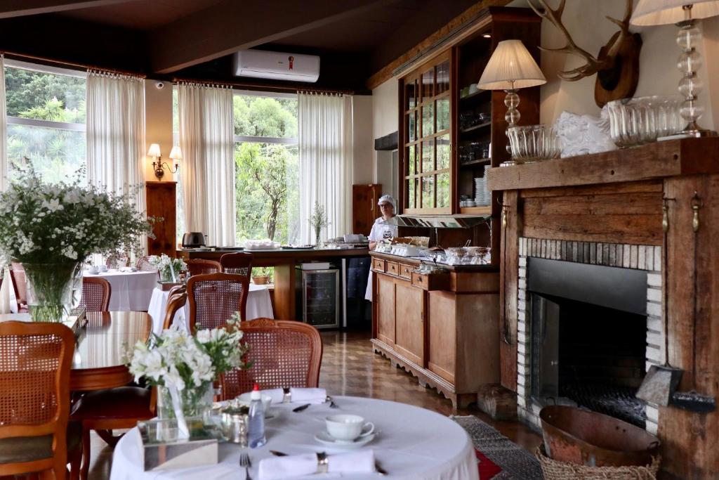 Um restaurante ou outro lugar para comer em Hotel Estalagem St. Hubertus