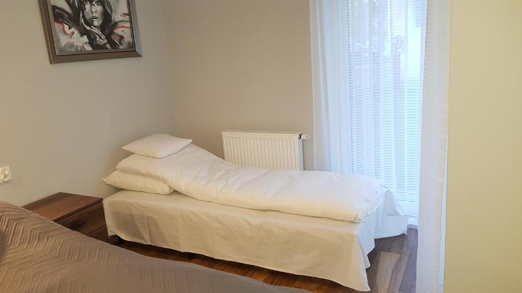 Posteľ alebo postele v izbe v ubytovaní New apartment 100m from old town and marina