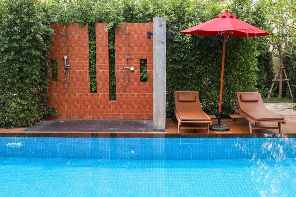 Golden Sea Pattaya - SHA Extra Plusの敷地内または近くにあるプール