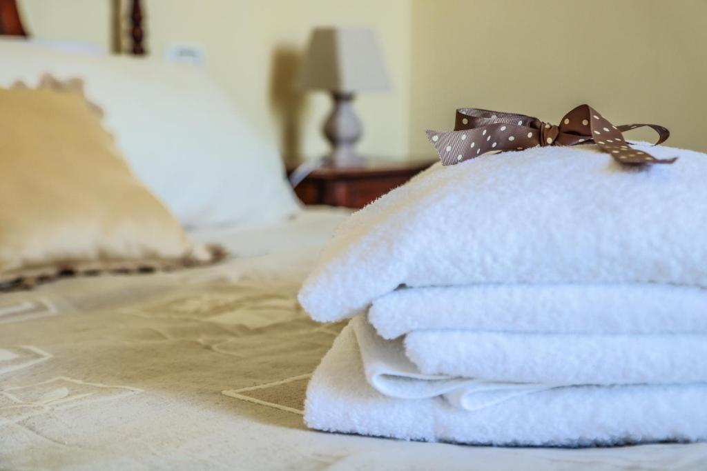 Postel nebo postele na pokoji v ubytování Scognamiglio Suites