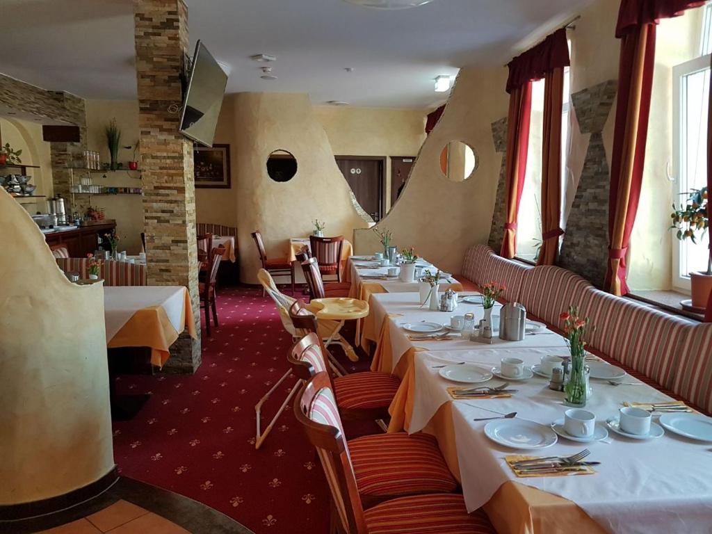 Posezení v ubytování Hotel Medaillon